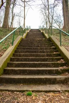 Looking Up Concrete Steps With a Green Railing in a Suburban Park in Pennsylv Stock Photos