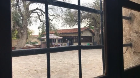 Looking the Courtyard from the Window Stock Footage 98297814