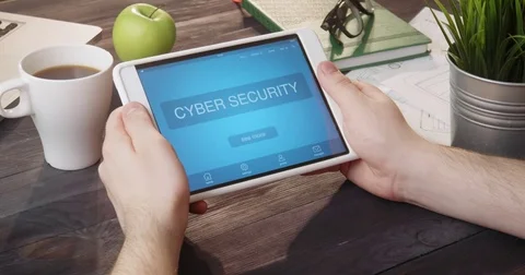 Looking at cyber security app using portable computer at desk Stock Footage