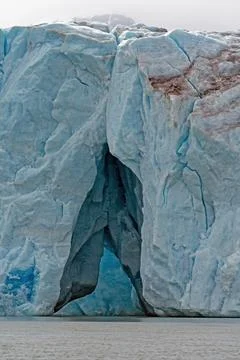Looking Deep Into a Crack in a Glacier Photos