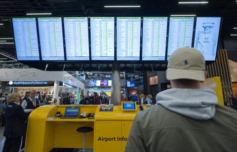 Looking at departure time Stock Photos