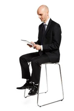 Looking at Digital Tablet Foto stock