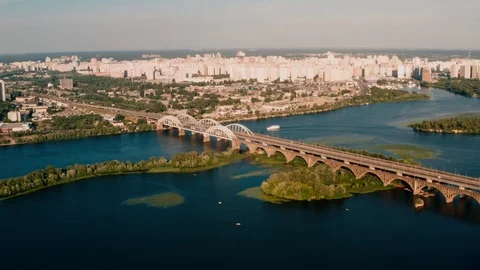 Looking directly at the bridge over the water on which the cars drive Stock Footage 111877914