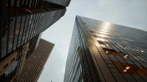 Looking directly up at the skyline of the financial district Ilustración de archivo