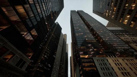 Looking directly up at the skyline of the financial district Ilustración de archivo