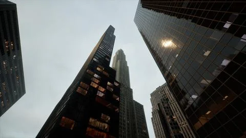 Looking directly up at the skyline of the financial district Ilustración de archivo