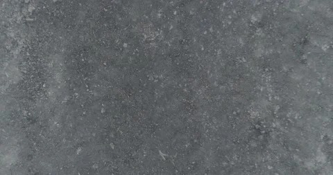 Looking at dirt as camera falls down to it Stock Footage 146541364