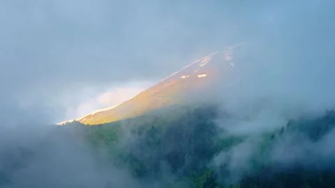 Looking at the distant mountains through the cloud window Stock Footage 314635398