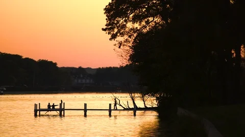 Looking at the Dock at Sunset Stock Footage 115276024