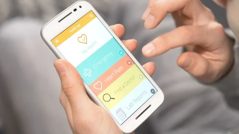 Looking for a Doctor on a Smartphone Device Video stock 86744318