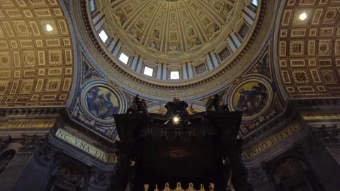 Looking up to the dome of St Peter's Basilica in Vatican City, pan upwards Stock Footage 153268059