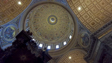 Looking up to the dome of St Peter's Basilica in Vatican City, Spiral pan Stock Footage 159976516