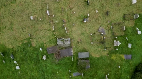 Looking down on an ancient Irish graveyard from above. Stock Footage 236497725