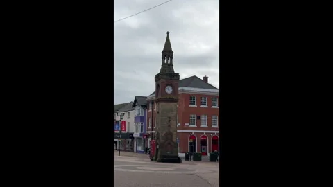 Looking down Aughton Street towards the Clock Tower in Ormskirk. Vertical Video 스톡 동영상 331029169