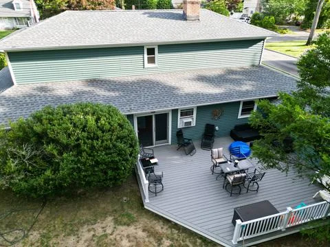 Looking down at backyard with a composite deck on a residential house Stock Photos