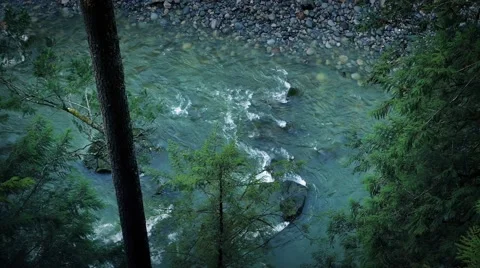 Looking Down On Blue River In Forest Stock Footage 60364137