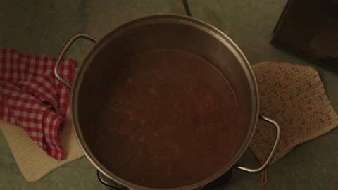 Looking Down At Boiling Soup On Kitchen Burner. Stock Footage 166813144