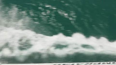 Looking down on bow wave from boat Stock Footage 92534196