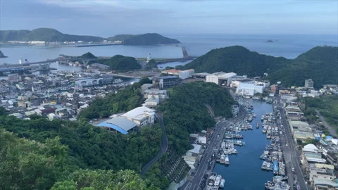 Looking Down On Busy Nanfang-ao Fishing Harbor Channel, Yilan, Taiwan Stock Footage 342831657