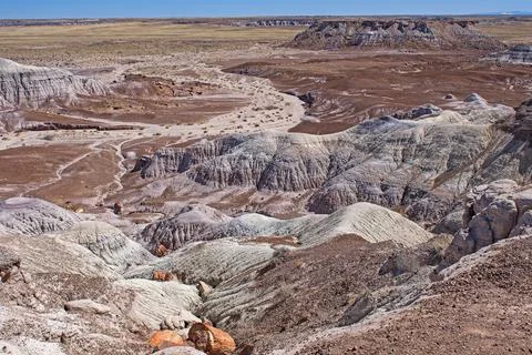 Looking Down Into a Canyon of Water Eroded Buttes Photos