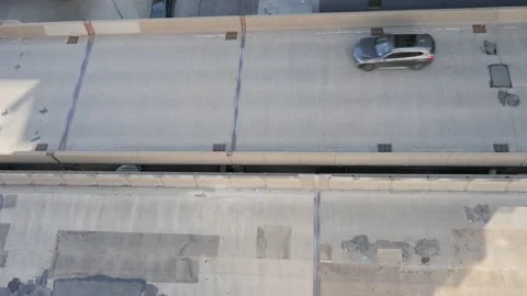 Looking down at cars going by Stock Footage 158515958