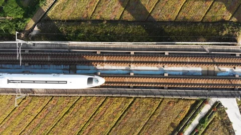 Looking down at Chinese high speed train tracks on raised platform. Stock Footage 93626445