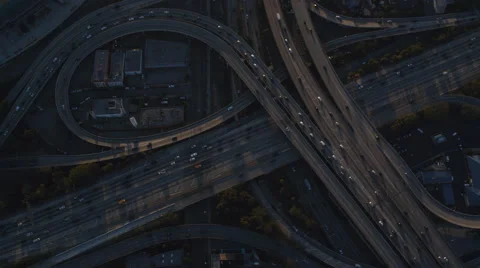 Looking down at a cloverleaf of highway interchanges in Los Angeles. Shot in Stock Footage 59526213