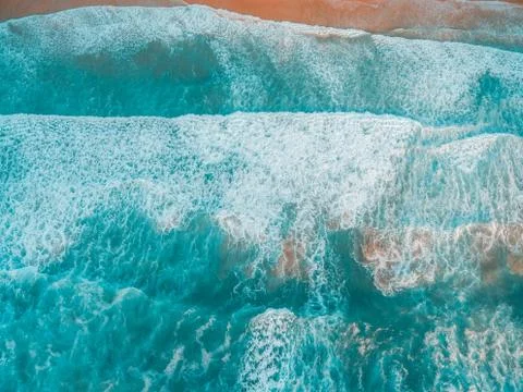 Looking down at crushing powerful ocean waves Stock Photos