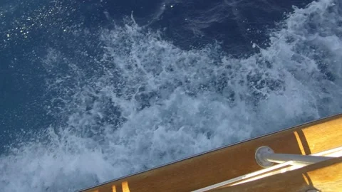 Looking down at a crusing boat and water on Lake Tahoe Stock Footage 219328215