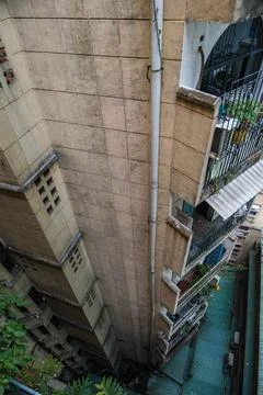 Looking Down a Deep Narrow Lightwell in an Old Apartment Building Stock Photos