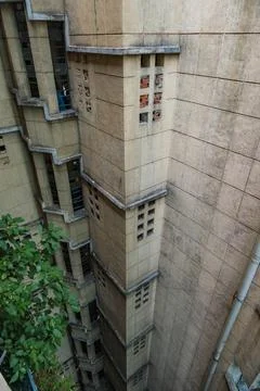 Looking Down a Deep Narrow Lightwell in an Old Apartment Building Stock Photos