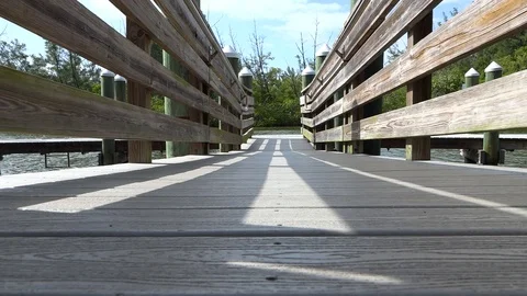 Looking Down a Dock with Water Stock Footage 118925751