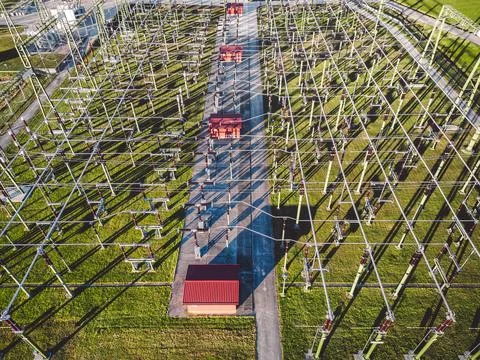 Looking down at electrical cables running at the electrical substation in the Stock Photos
