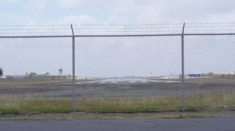 Looking down empty airstrip airfield airport Stock Footage 39340420