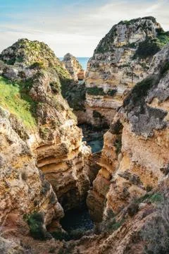 Looking down into an eroded limestone gorge Stock Photos