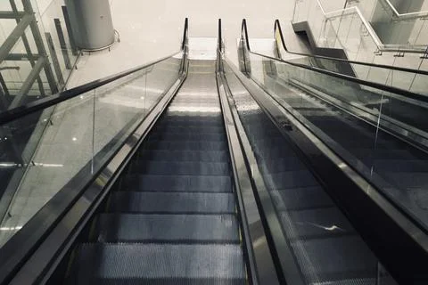 Looking down at the Escalator - Stock Image Stock Photos