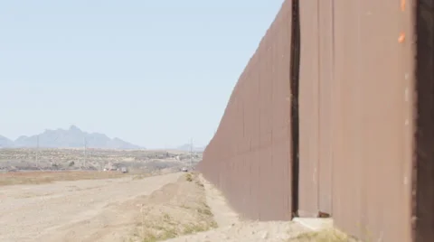 Looking Down the Fenceline on the US and Mexico Border Stock Footage 60406150