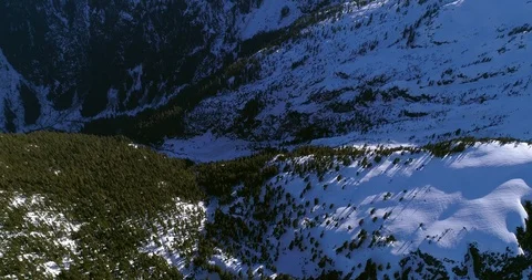 Looking down flying over Mountain Side Stock Footage 91377604