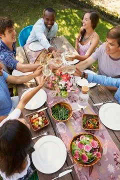Looking Down On Friends Making A Toast At Outdoor Party Stock Photos