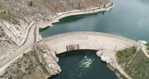 Looking down on a functioning dam Stock Footage 132825970