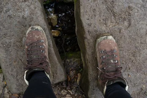 Looking down at hiking boots 写真素材