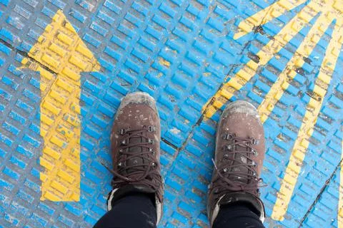 Looking down at hiking boots 写真素材
