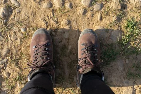 Looking down at hiking boots 写真素材