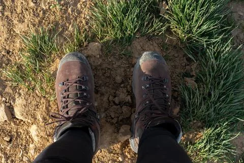 Looking down at hiking boots 写真素材