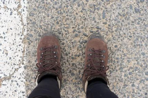 Looking down at hiking boots 写真素材