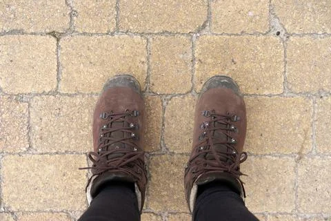 Looking down at hiking boots 写真素材