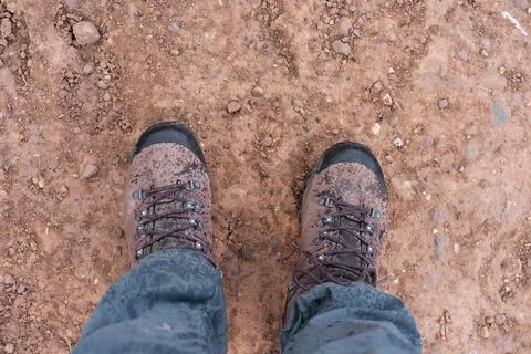Looking down at hiking boots 写真素材