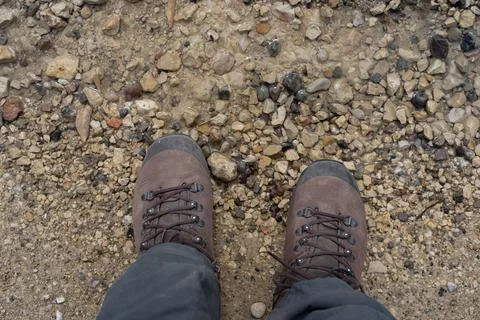 Looking down at hiking boots 写真素材