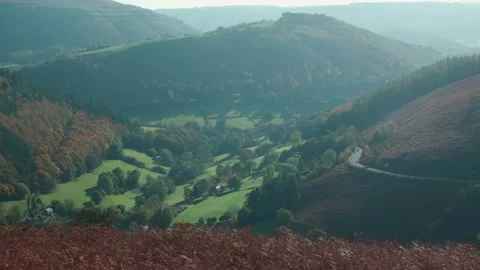 Looking down the The Horse Shoe Pass, A542, near Llangollen, Denbighshire, Wales Stock Footage 130908306