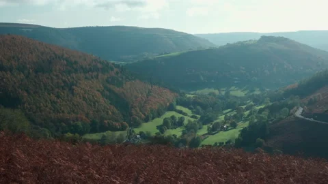 Looking down the The Horse Shoe Pass, A542, near Llangollen, Denbighshire, Wales Stock Footage 130908669